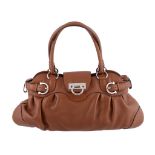 Salvatore Ferragamo,   a brown leather handbag, with chrome trim, and internal zip pocket, 42cm