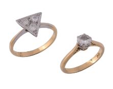Two diamond rings,   the first with a trio of brilliant cut diamonds in a triangular setting,