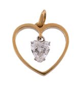 A heart diamond pendant,   the central heart shaped diamond within an openwork heart shaped