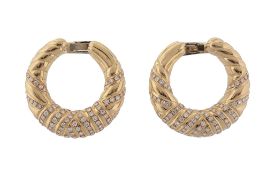 A pair of diamond earrings,   the hoops set with rows of brilliant cu diamonds, with clip fittings,