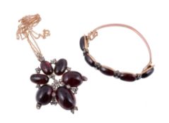 A Victorian diamond and garnet pendant and bangle,   the pendant with graduated cabocohon garnets