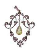 A peridot, diamond and seed pearl pendant  , circa 1900, the pierced foliate gold backed silver