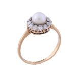 A pearl and diamond ring,   the central 6mm pearl within a surround of old cut diamonds, stamped