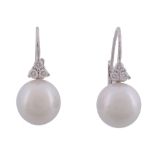 A pair of diamond and South Sea cultured pearl earrings  , the cultured pearls measuring 12mm