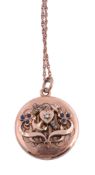 A gold locket,   the circular locket with a later applied seed pearl and sapphire set panel in the