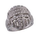 A diamond bombe dress ring,   the pierced domed panel set throughout with brilliant cut diamonds,