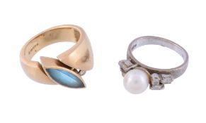 A cultured pearl and diamond dress ring,   the 7mm cultured pearl set between eight cut,