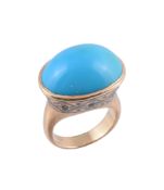 A blue stone ring,   the oval cabochon blue stone collet set within a foliate detail surround