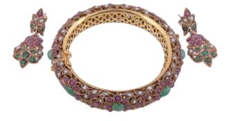 A multi gem bangle and ear pendants  , the Indian style bangle set with oval cabochon emeralds