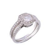 A diamond cluster ring,   the central ascher cut diamond stated to weigh 0.39 carats, within a