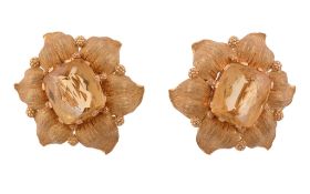 A pair of citrine earrings by Buccellati,   the rectangular mixed cut citrines within a gold