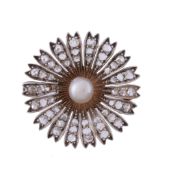 A diamond and pearl flower head brooch,   circa 1900, the flower head set with a central pearl