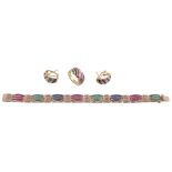 A multi gem set suite of jewellery,   comprising a bracelet with alternating ruby, emerald and