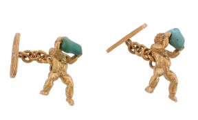 A pair of putti cufflinks  , the putti shaped terminals each holding a piece of turquoise, with