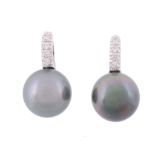 A pair of diamond and black South Sea cultured pearl earrings  , the cultured pearls measuring 11mm