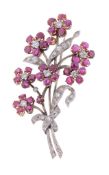 A ruby and diamond floral spray brooch,   circa 1960, the ruby flower heads each centred with a