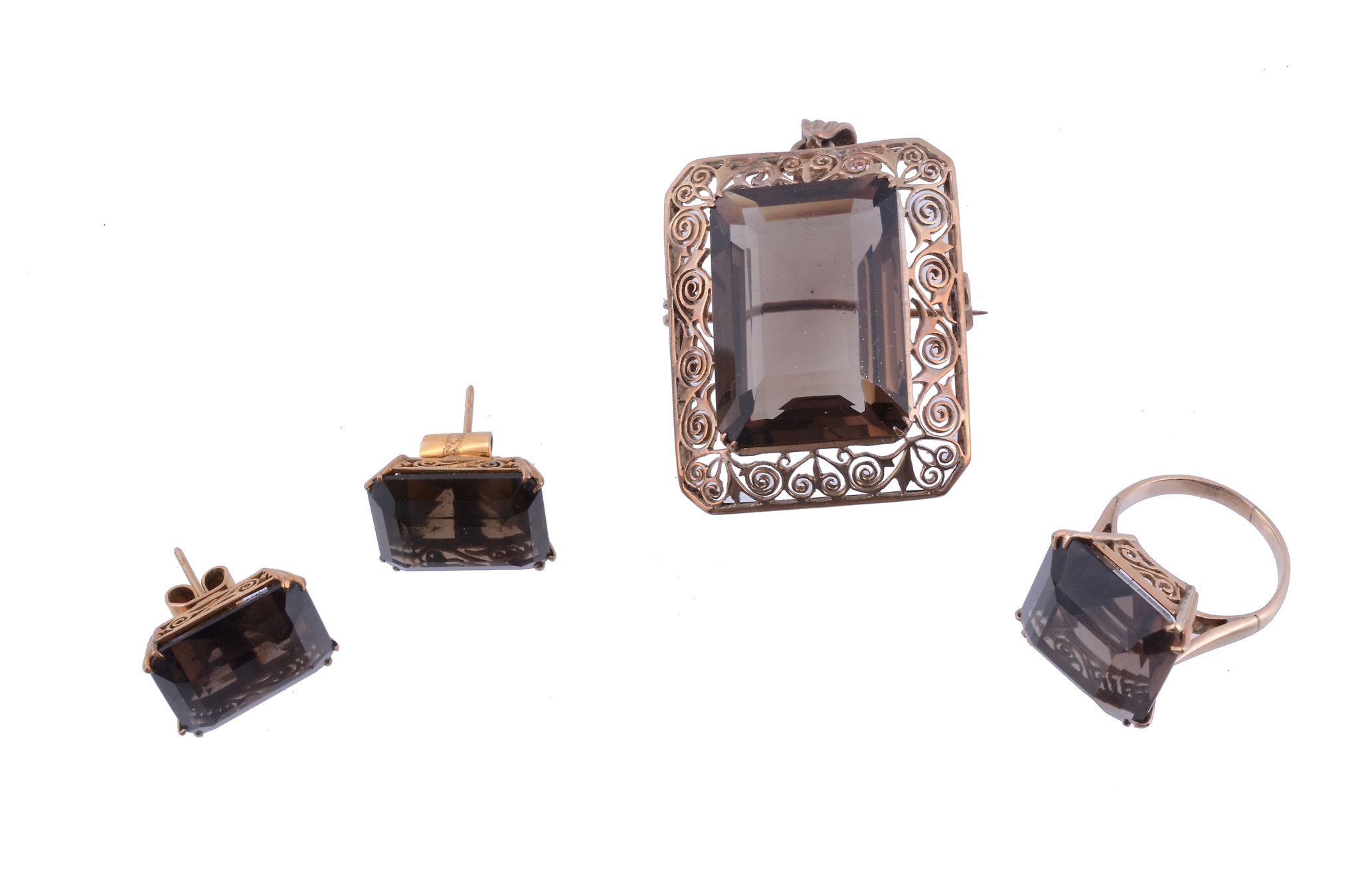 A smokey quartz jewellery suite,   comprising a ring; a pair of earstuds; and a pendant/brooch;