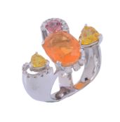 A multi gem set dress ring,   the oval shaped fire opal claw set with brilliant cut diamond