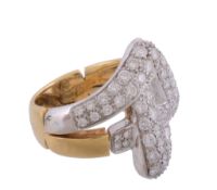 A diamond dress ring,   composed of two intertwining panels set throughout with brilliant cut