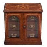 A late Victorian mahogany and boxwood strung table cabinet , circa 1890   A late Victorian