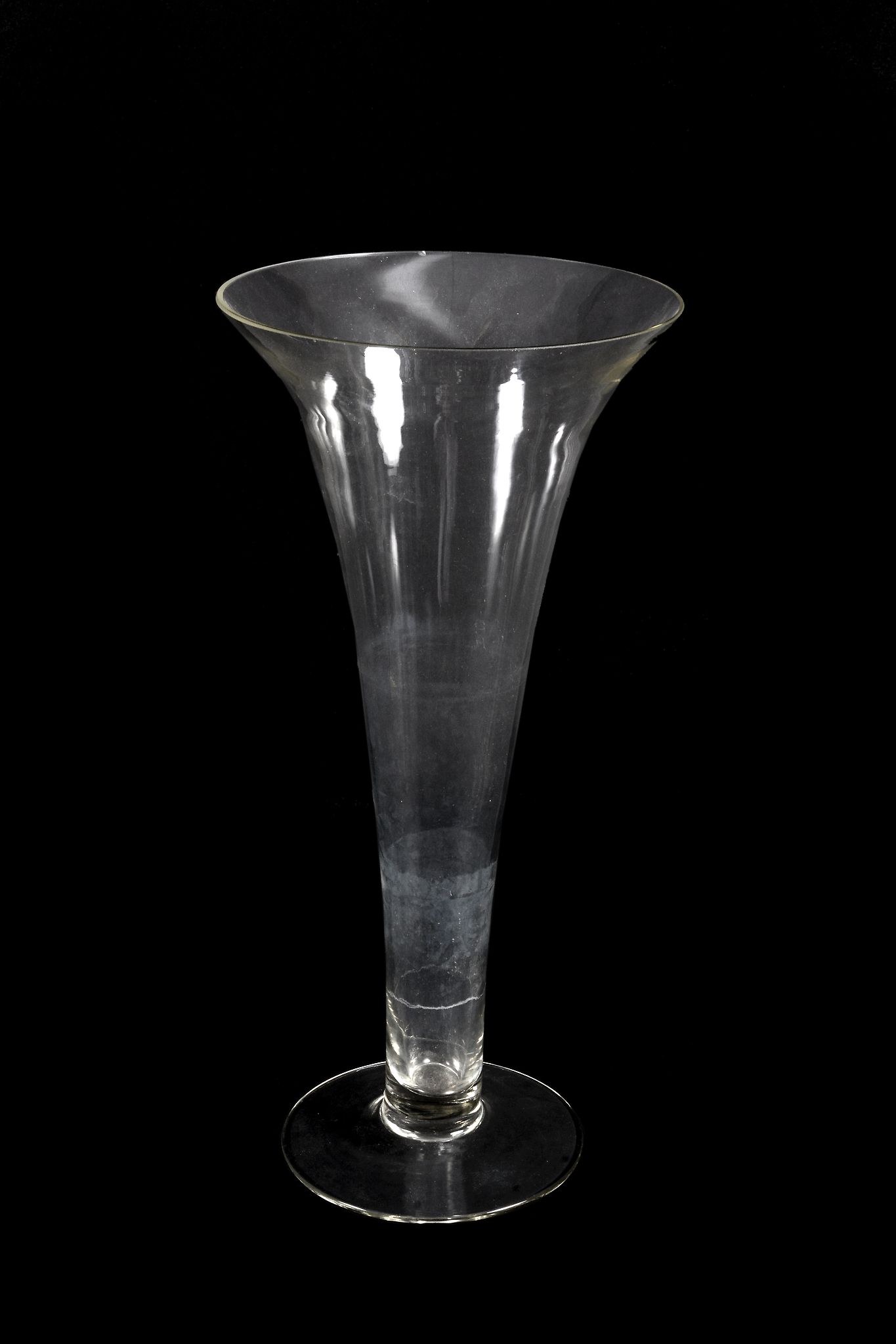 A glass vase, of drawn trumpet form, 49cm high; a tall slender opaque-white...   A glass vase, - Image 2 of 2