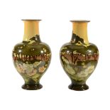 A pair of Doulton Lambeth Faience tall vases   A pair of Doulton Lambeth Faience tall vases,