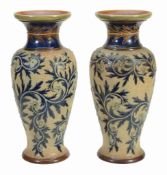 A pair of large Royal Doulton stoneware baluster vases by George Tinworth   A pair of large Royal