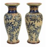 A pair of large Royal Doulton stoneware baluster vases by George Tinworth   A pair of large Royal
