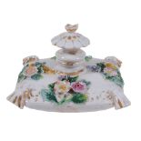 A Meissen model of a flower-encrusted scent bottle annd stopper   A Meissen model of a flower-