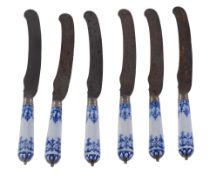 Six St. Cloud blue and white porcelain knife handles with steel blades   Six St. Cloud blue and