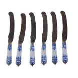 Six St. Cloud blue and white porcelain knife handles with steel blades   Six St. Cloud blue and