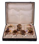 A Royal Worcester boxed set of six coffee cups and saucers variously signed...   A Royal Worcester