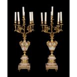 A pair of gilt metal mounted onyx six light candelabra in Louis XV taste,   last quarter 20th