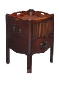 A George III mahogany night commode  , circa 1780, the top with shaped gallery incorporating