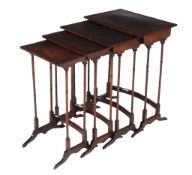 A nest of mahogany quartetto tables  , late 19th century, each with central inset flame mahogany