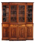 A George III mahogany breakfront library bookcase  , circa 1780, the moulded cornice above four
