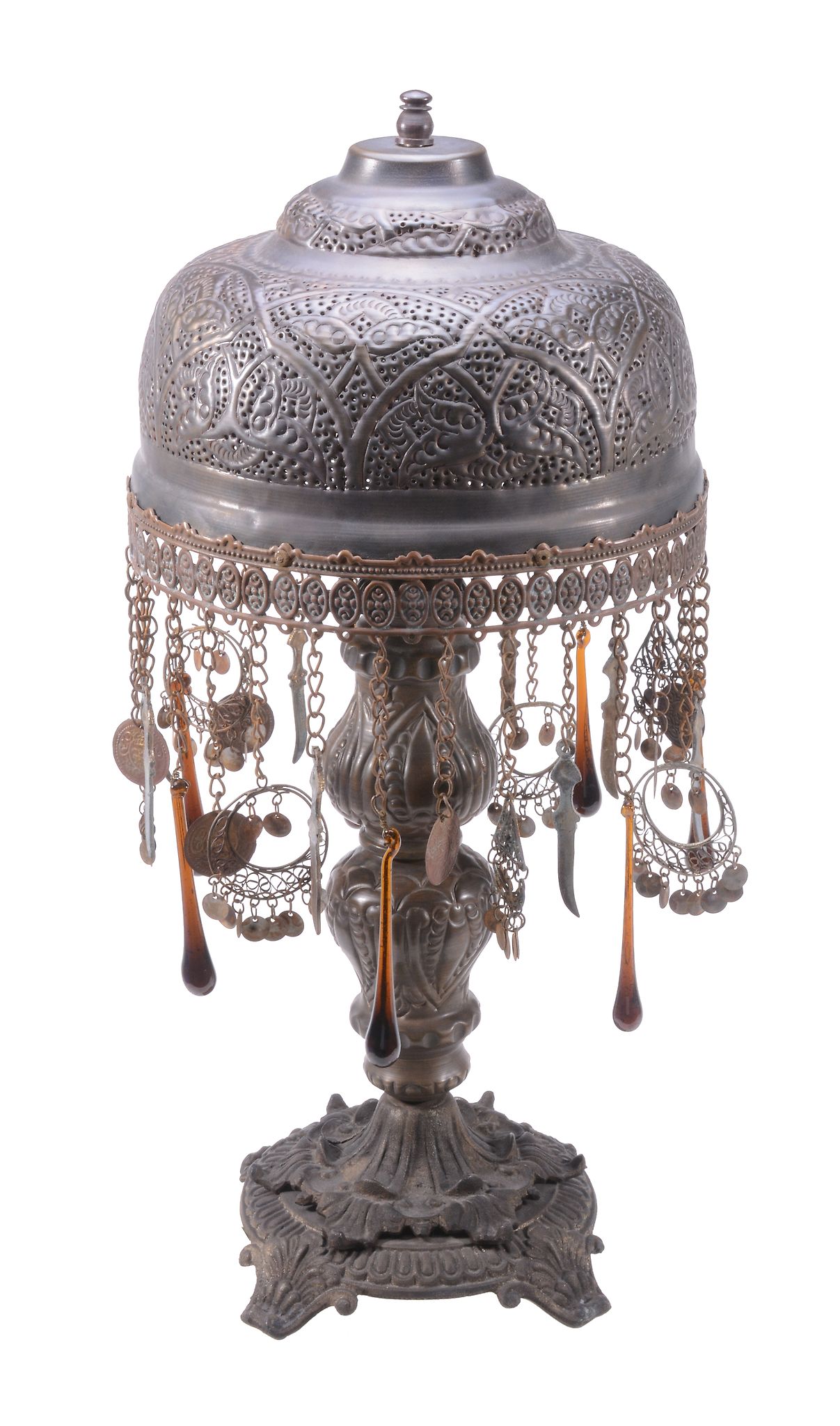 A north African brass standard lamp,   20th century, the domed shade pierced and embossed with