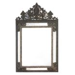 An embossed brass mounted wall mirror in 17th century Dutch style  , 19th century, the surmount