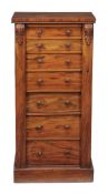 A Victorian walnut Wellington chest,   circa 1850, with seven drawers flanked by plain pilasters