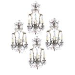 A set of four silvered metal and glass adorned three light wall appliques,   20th century, the