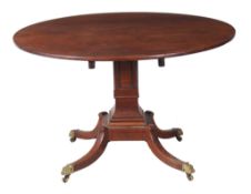 A Regency mahogany centre or dining table  , circa 1815, the circular top above a square beaded