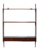 A set of George III mahogany hanging wall shelves  , circa 1800, the open shelves above two short
