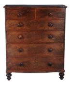 A George IV mahogany chest of drawers,   circa 1825, of bowfront outline, the top above two short