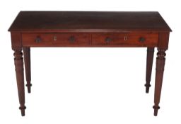 An early Victorian mahogany writing table  , circa 1840, the rectangular top above two short