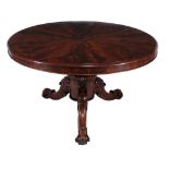 A Victorian mahogany circular centre table  , circa 1860, the top with figured mahogany radiating