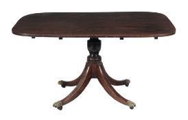 A George III mahogany breakfast table  , circa 1800, the rectangular top with rounded corners and
