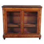 A Victorian walnut side cabinet  , circa 1870, the rectangular top with ebonised edge above an