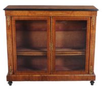 A Victorian walnut side cabinet  , circa 1870, the rectangular top with ebonised edge above an