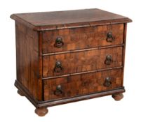 A miniature parquetry and walnut chest of drawers,   possibly central European, 19th century and