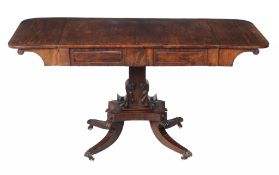 A George IV mahogany and crossbanded sofa table  , circa 1825, the rectangular top with rounded